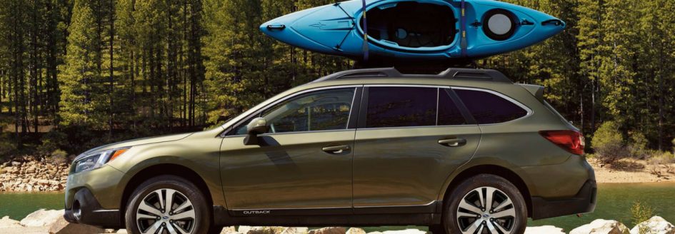 The 2018 Subaru Outback transporting a kayak, in a blog post about summer destinations in Wellington, FL.